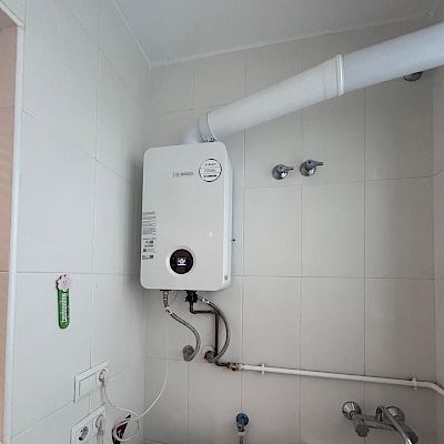 A new Bosch gas heater installed in the utility room