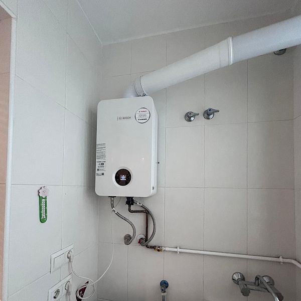 A new Bosch gas heater installed in the utility room